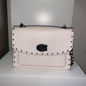 Coach bag , small size cream color